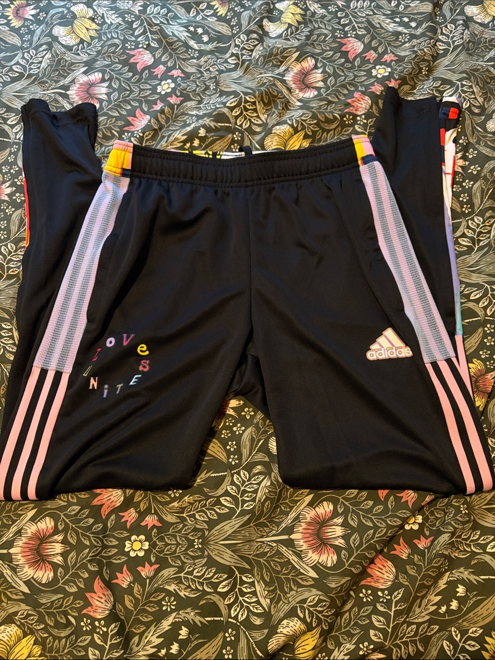 Adidas “love unites” pride soccer track pants.